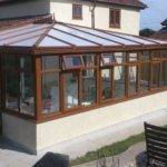 New conservatory with brown uPVC frames.