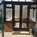 New conservatory with wood effect frames.